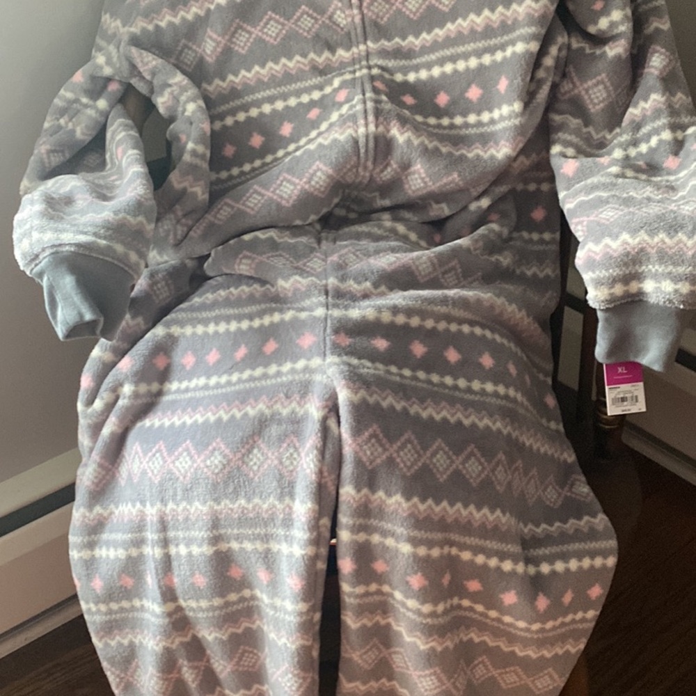 Grey and pink fleece onesie with hood. Zip front.